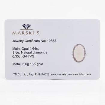 Sormus, 18k valkokultaa, opaali n. 4.64 ct ja timantteja n. 0.35 ct yht todistuksen mukaan.