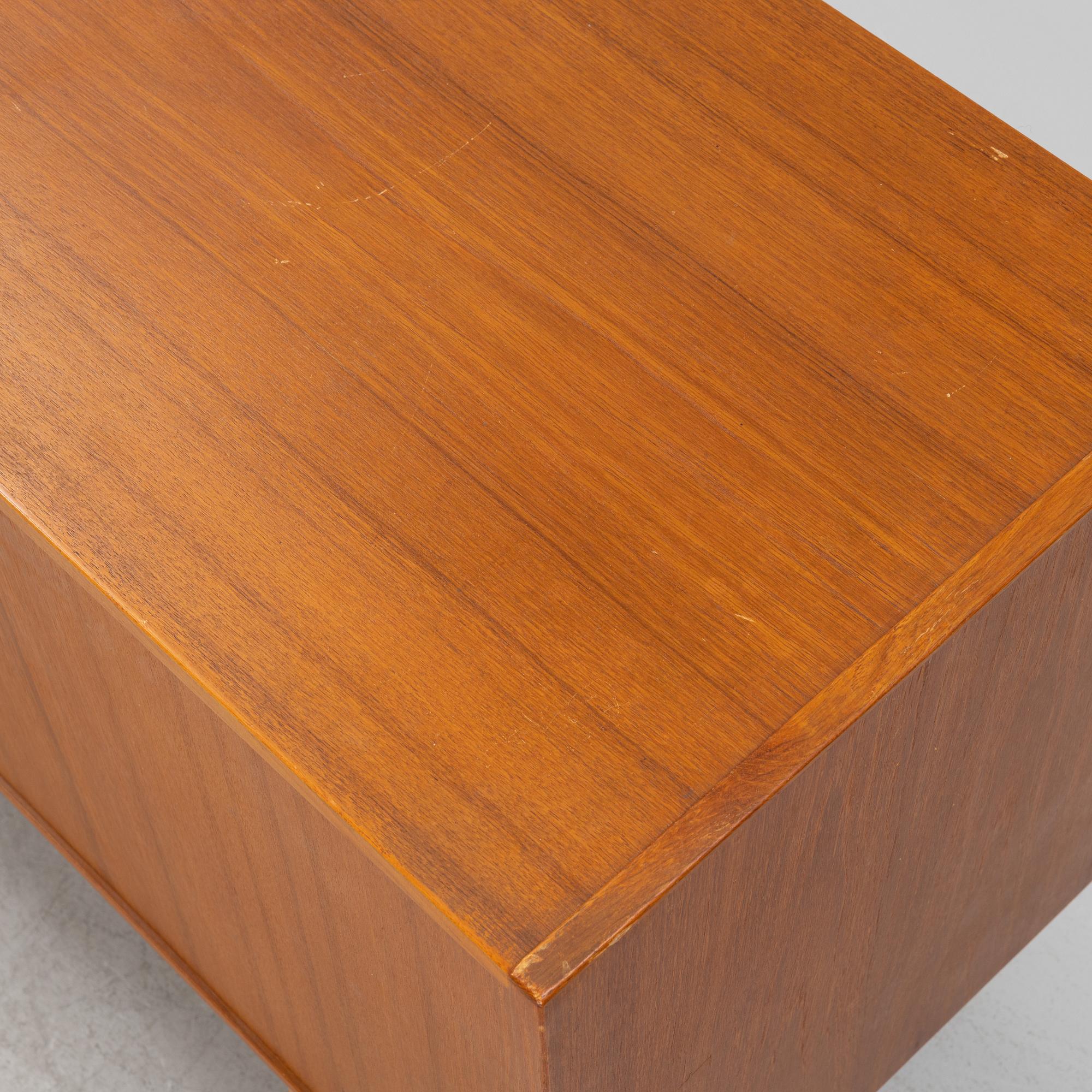 A 1950's/60's teak veneered sideboard.