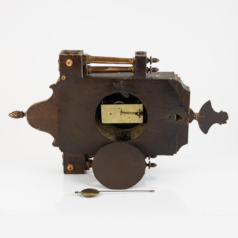 A Gustavian wall clock, 19th century.