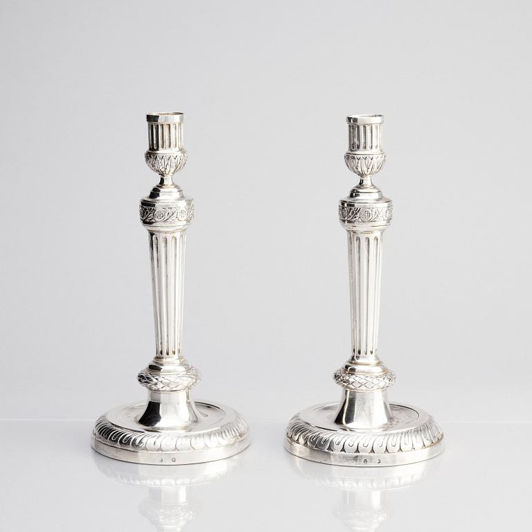 A pair of Austrian Royal, Three-armed silver candelabras, marks of lgnaz Joseph Würth, Vienna 1779.