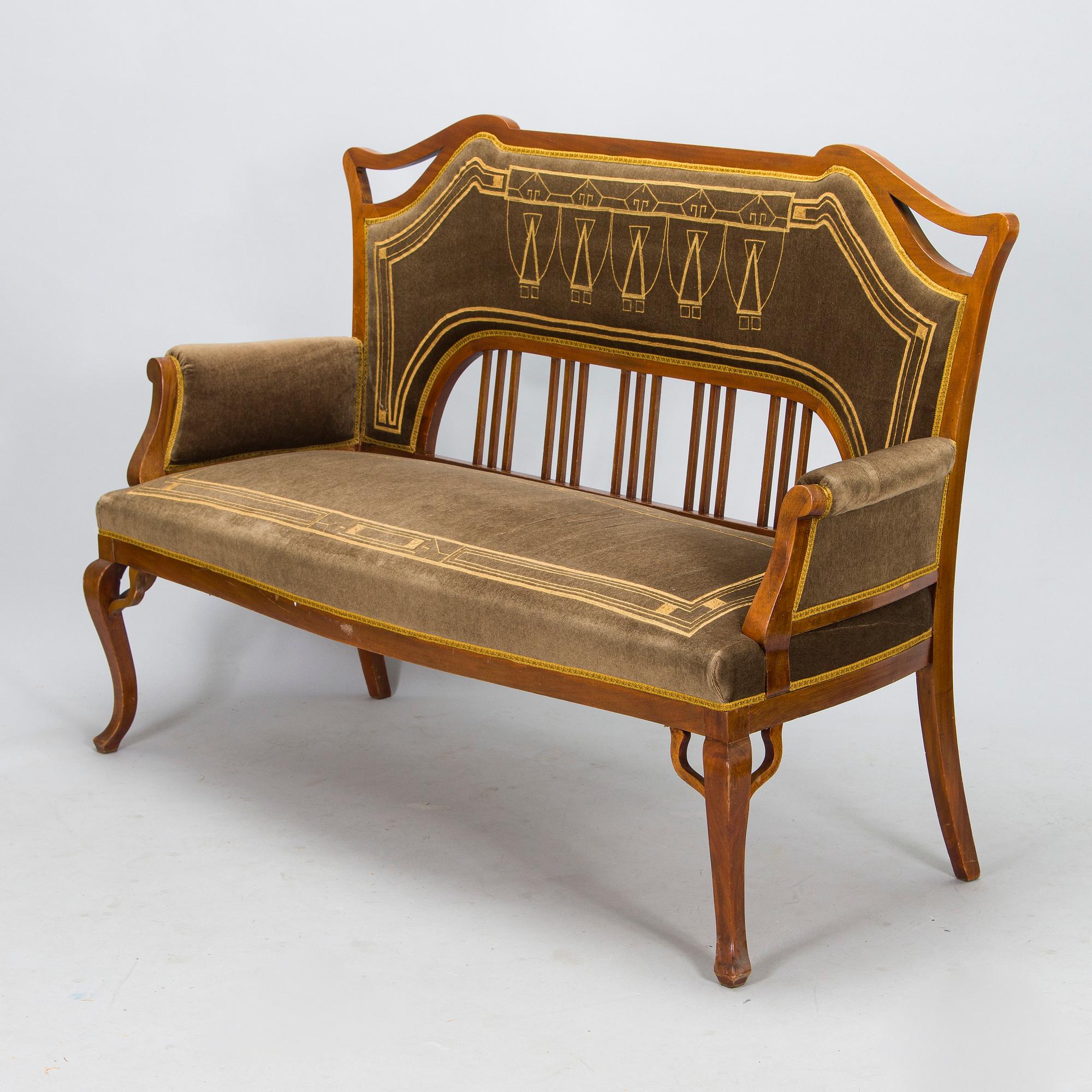 An eight piece Art Nouveau lounge suite in mahogany, Belgium/Netherlands, early 20th century.