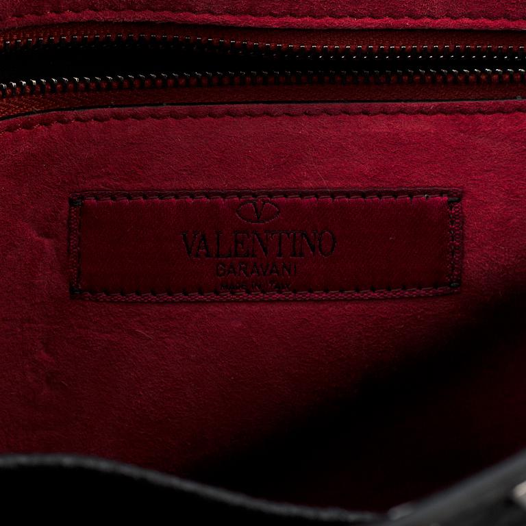 A bag by Valentino, "Rockstud Spike".