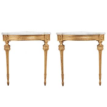 A pair of Gustavian late 18th century corner console tables.