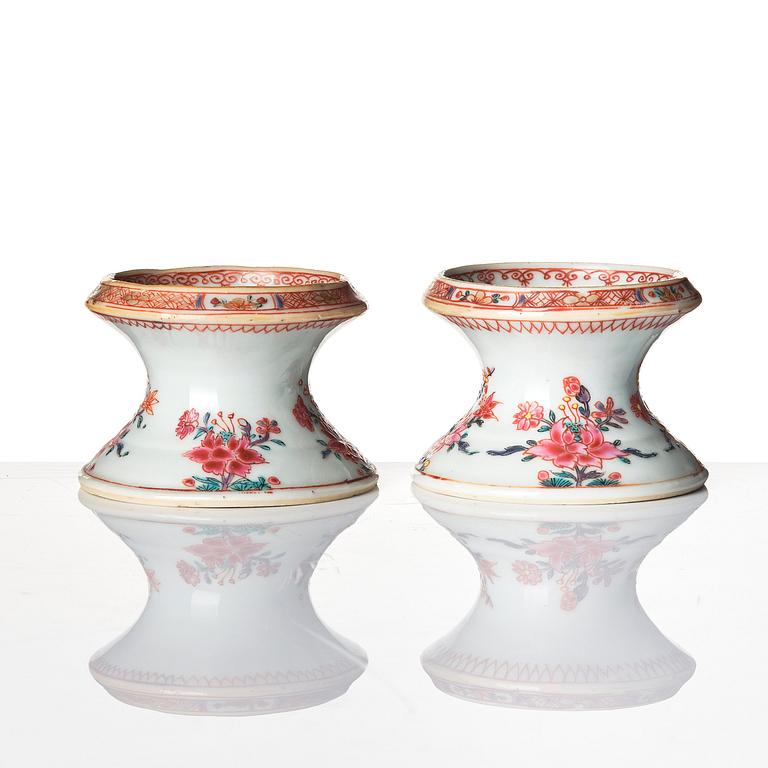 A pair of famille rose salts and a sauce boat, Qing dynasty, Qianlong (1736-95).