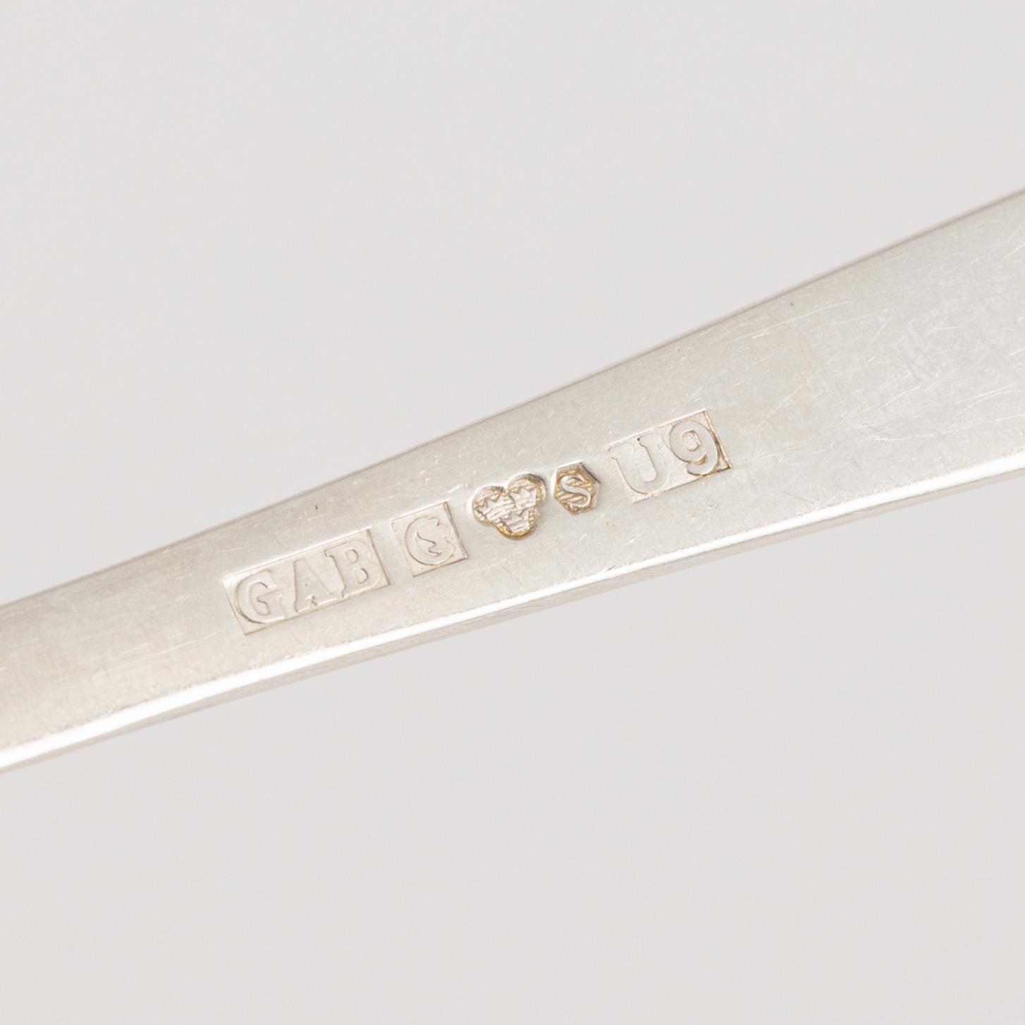 Jacob Ängman, a 31-piece Swedish silver cutlery, model 'Rosenholm', bearing the mark of GAB, including Eskilstuna, 1970.