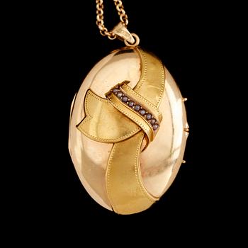 MEDALJONG MED KEDJA, 18 k guld, svenska stämplar  1917. Total vikt ca 18 g.