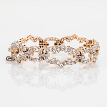 A 14K gold and platinum bracelet set with rose-cut diamonds.