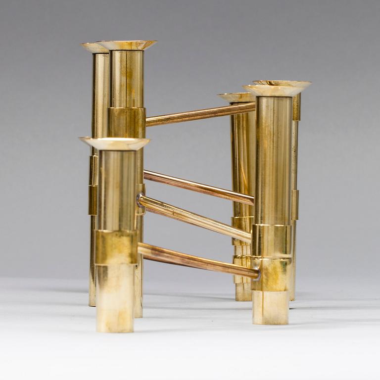 KANDELABER, "Serieljusstake Nonstop", mässing, design Tapio Wirkkala, Hopeakeskus 1970-tal.