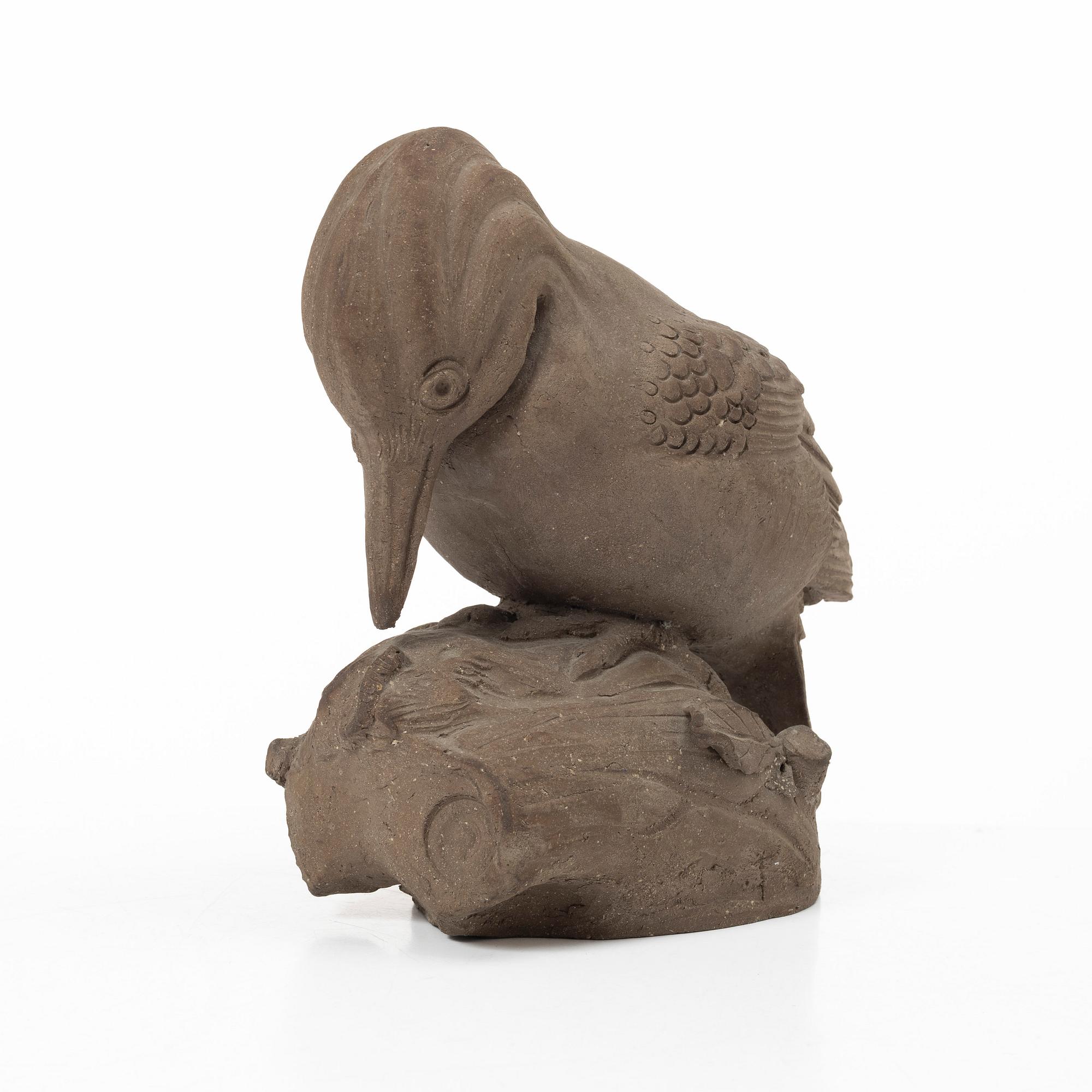 Tyra Lundgren, a stoneware sculpture of a woodpecker, executed in her own studio.