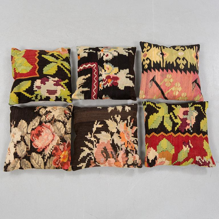 Six kelim pillows.