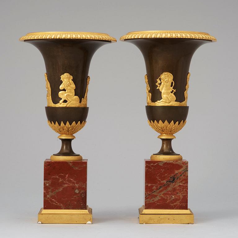 A pair of French Empire early 19th century urns.