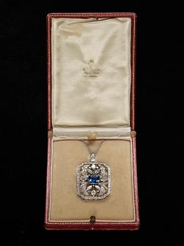 A W.A. Bolin platinum, blue sapphire, app. 4.60 cts, and diamond pendant/brooch, tot. 4.69 cts. Stockholm 1930.