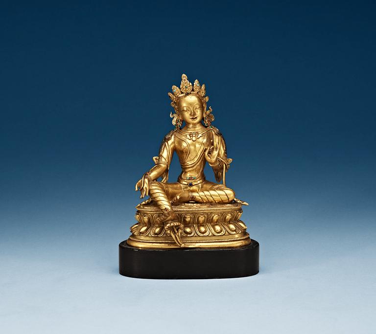 A gilt bronze figure of Green Tara, Sino-Tibetan, 18th Century.