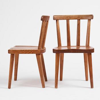 Axel Einar Hjorth, a set of six "Utö" stained pine chairs, Nordiska Kompaniet 1930s.