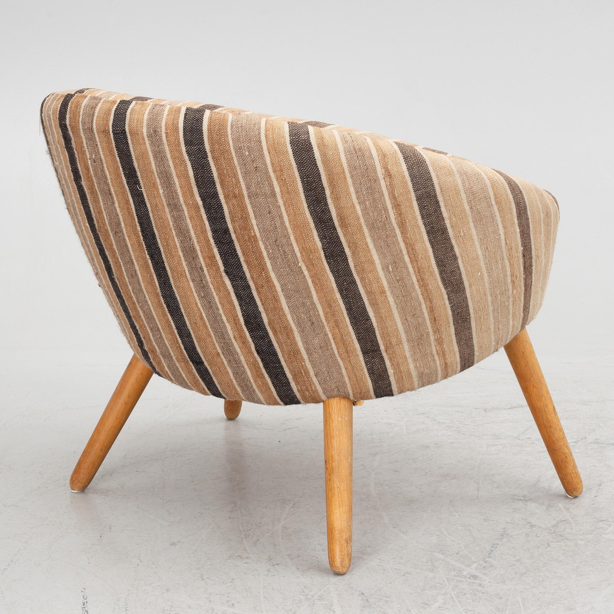 Nanna Ditzel, a lounge chair, AP 26, Anker Pedersen's furniture factory, mid-20th Century.