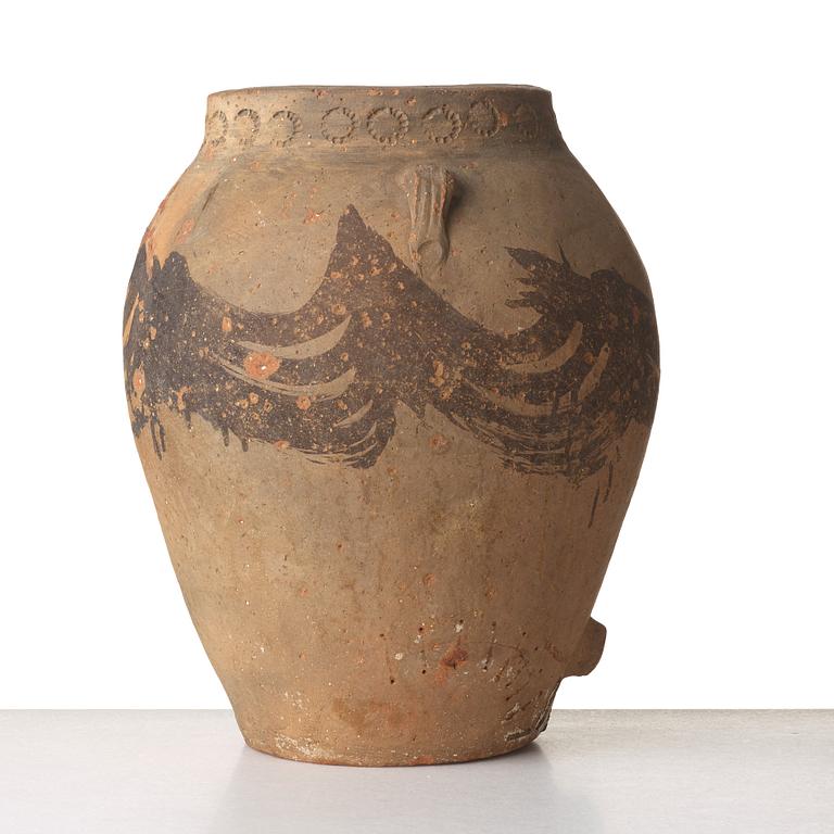 A large teracotta wine jar, Medeterranian area.