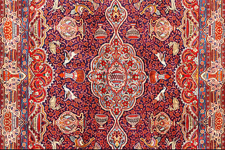 A Kashmar carpet, c. 415 x 285 cm.