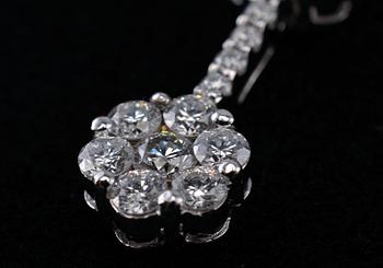 RIIPUS, briljanttihiottuja timantteja n. 1.22 ct. 18 K valkokultaa. Paino 4,2 g.