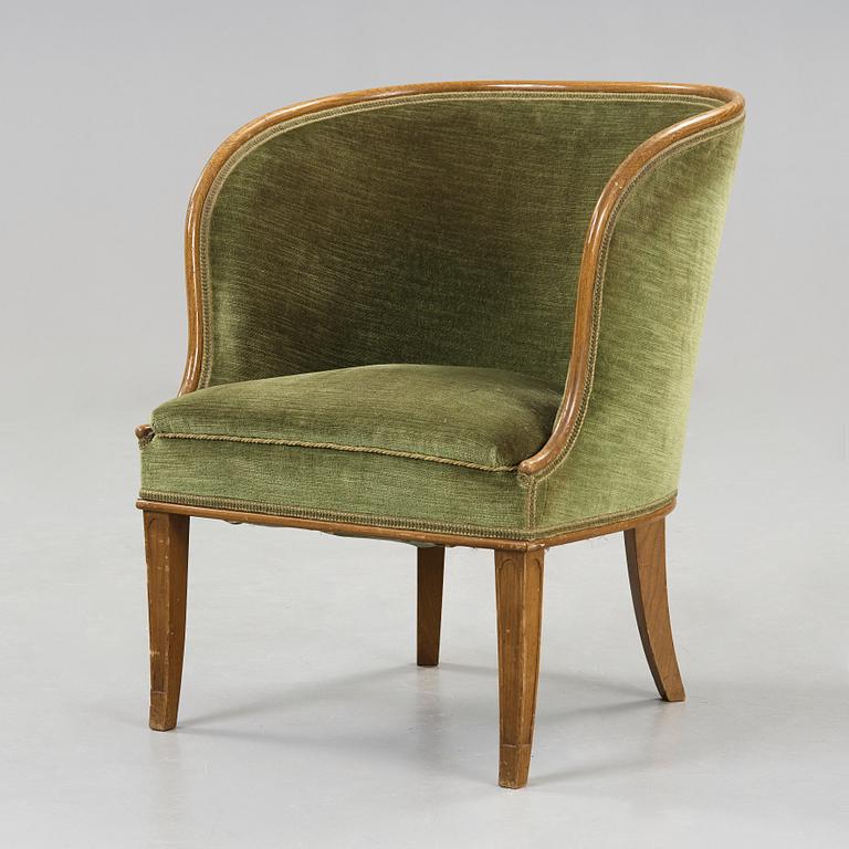 Axel Einar Hjorth, A 'Bellman' elm armchair, attributed to Axel Einar Hjorth, Nordiska Kompaniet, Sweden ca 1929.