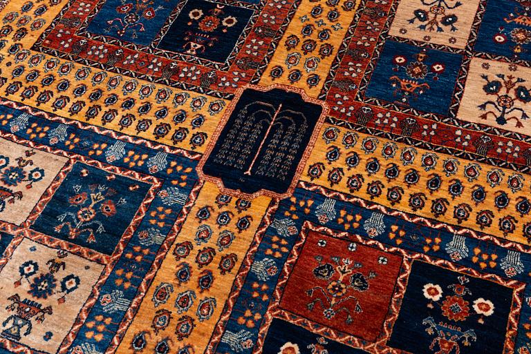An oriental 'garden' carpet of Safavid design probably from the Shiraz area, Iran, c 343 x 254 cm.