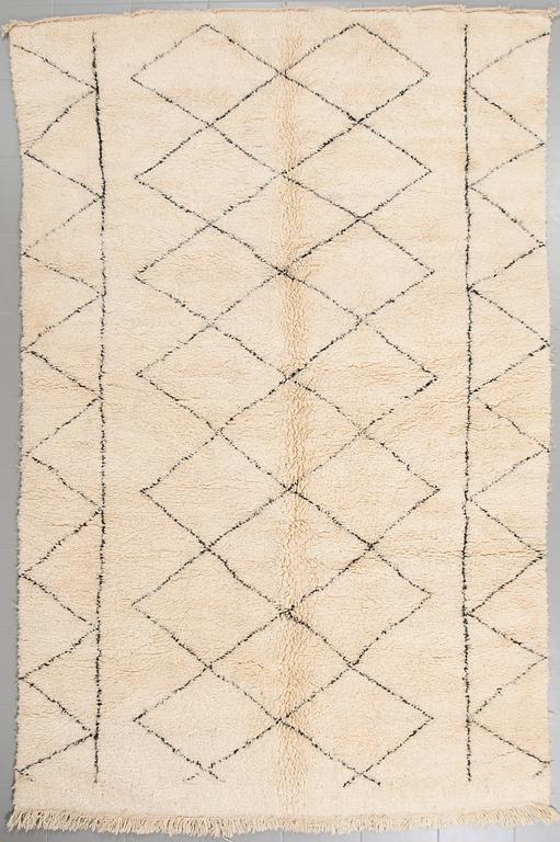 A moroccan rug, ca 308 x 200 cm.