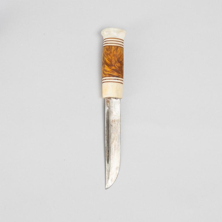 Ingvar Svonni, a reindeer antler knife, signed.