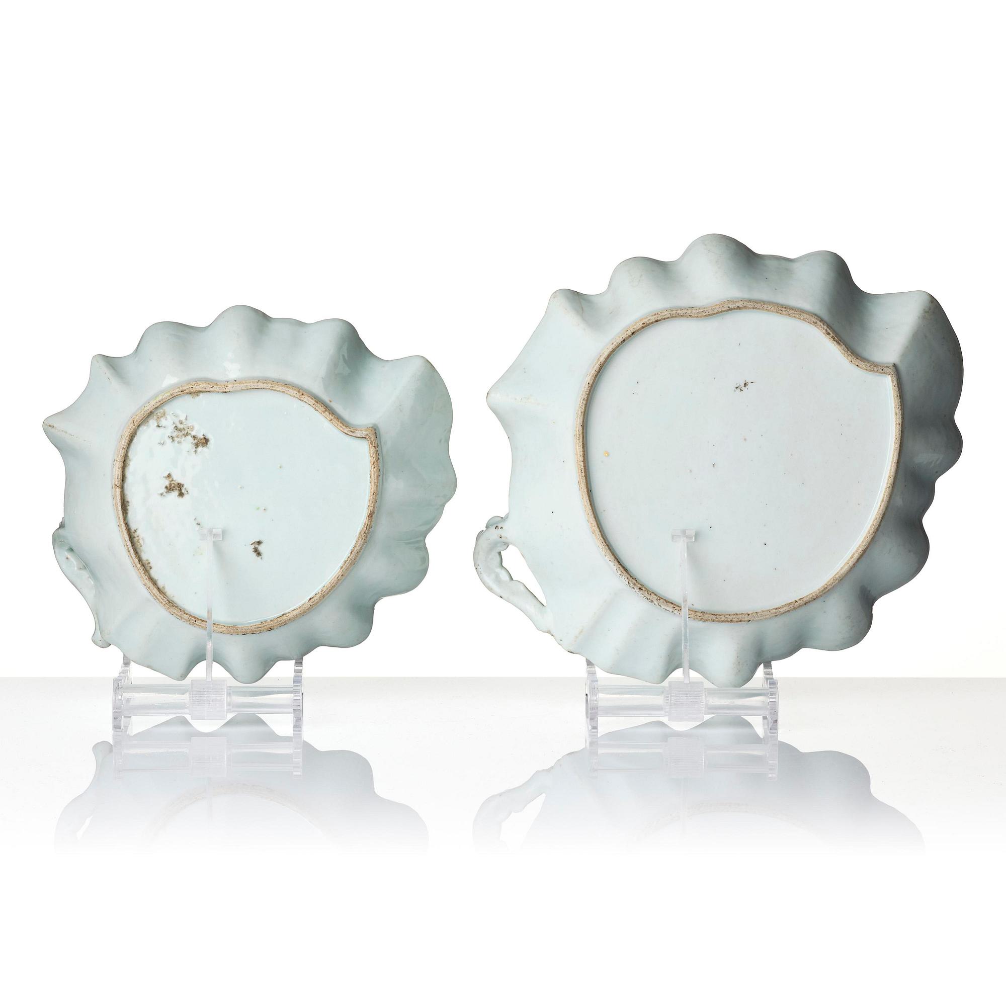 A pair of leaf shaped 'European subject' dishes, Qing dynasty, 18th century.