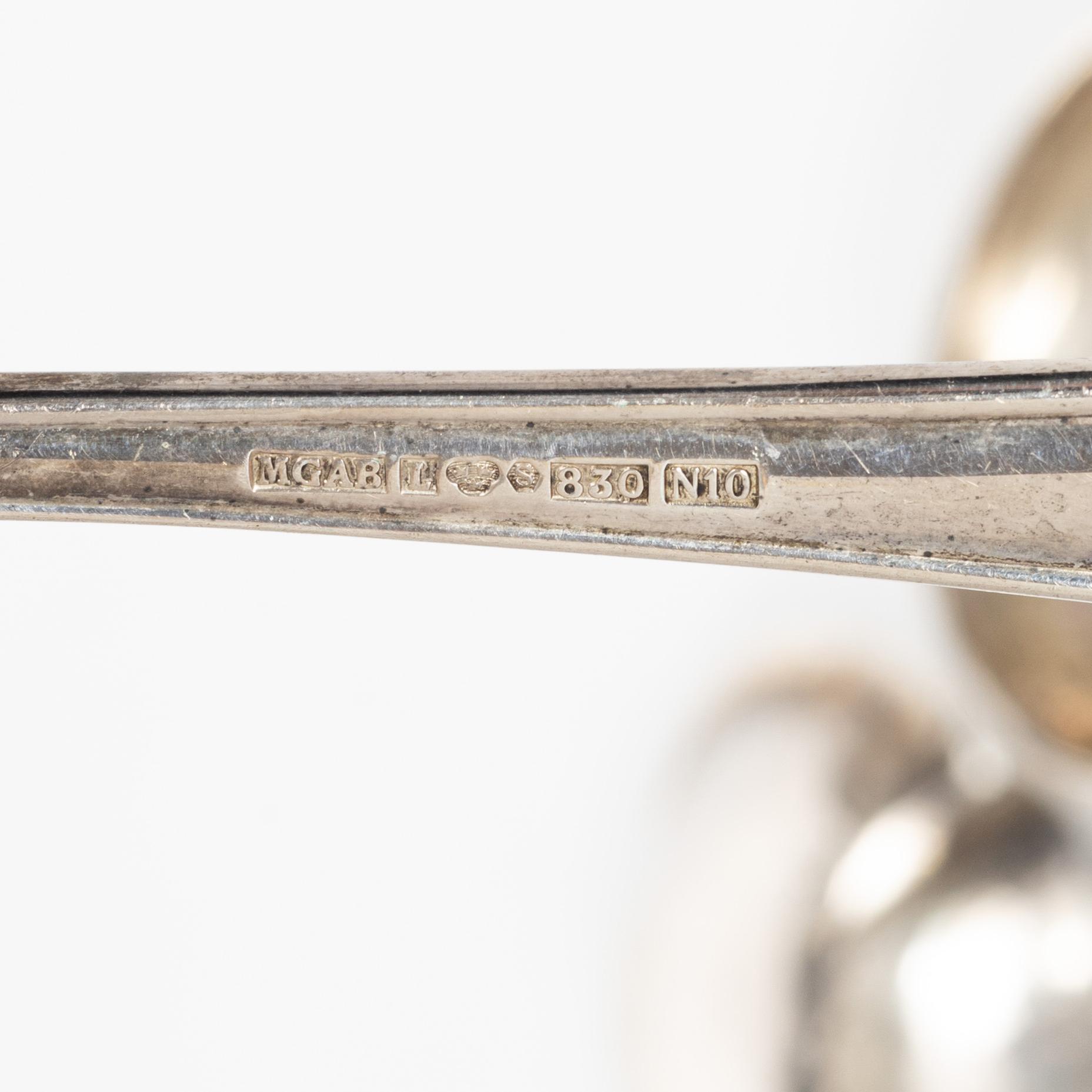 Serveringsbestick och skrammelskedar, 10 st, silver, 1800-1900-tal.