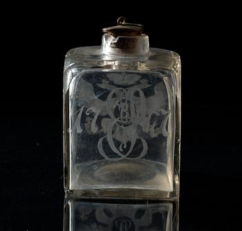 A Russian glass tea caddy, dated 1747.