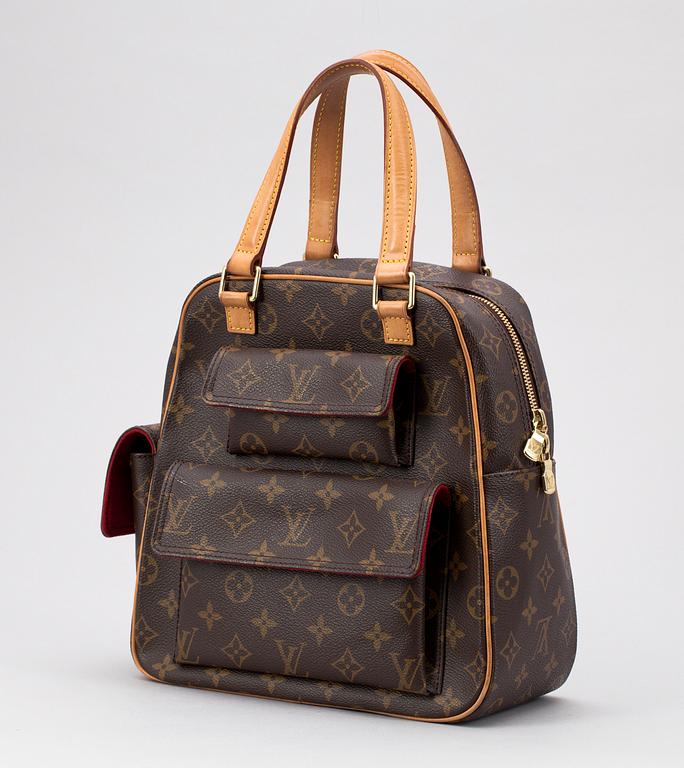 A monogram canvas handbag by Louis Vuitton, "Viva- Cite PM" 2003.