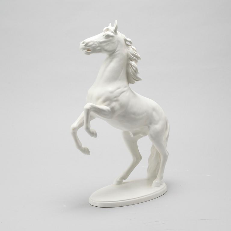 A porcleain figurine, probably by Gerhard Bochmann for Goebel, 20th century.