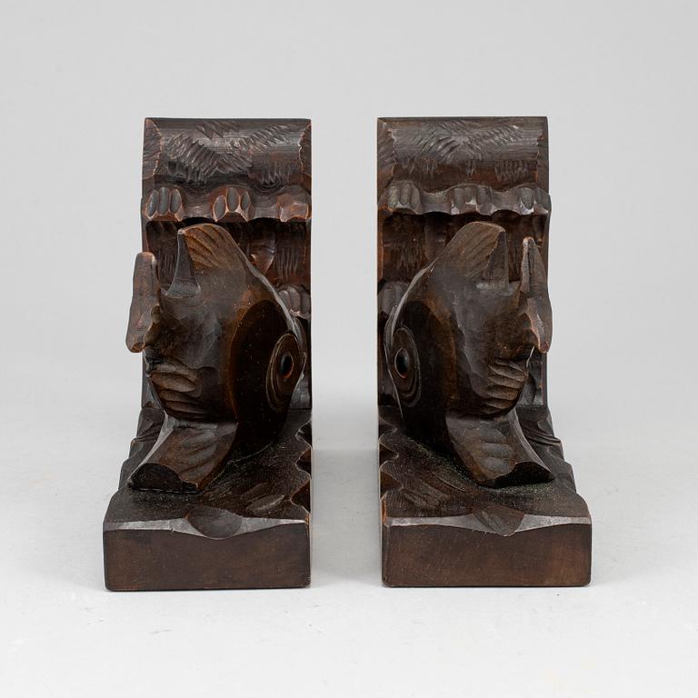 A pair of dark wood book ends, first half of the 20th century.