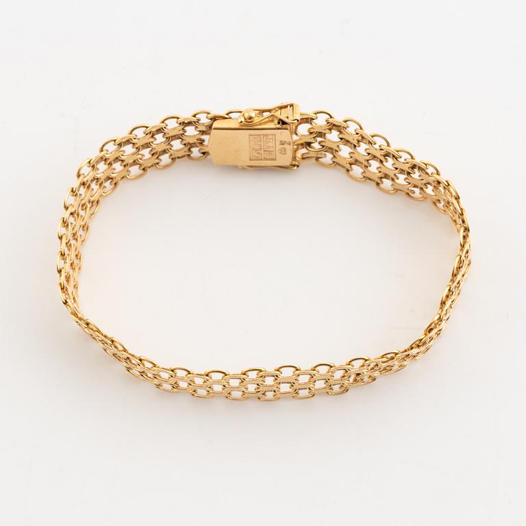 18K gold bracelet.