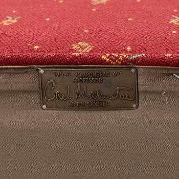 Carl Malmsten, a 'Häggbom' armchair with a 'Jättepaddan' ottoman, AB OH Sjögren, Tranås.