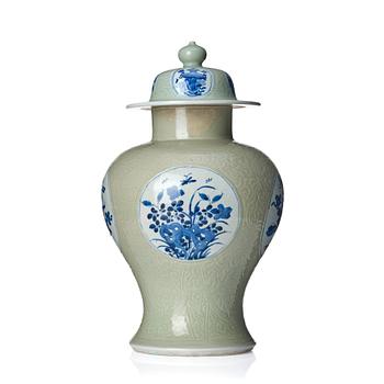 1106. A Chinese blue and white celadon-ground baluster vase with cover, Qing dynasty, Kangxi (1662-1722).