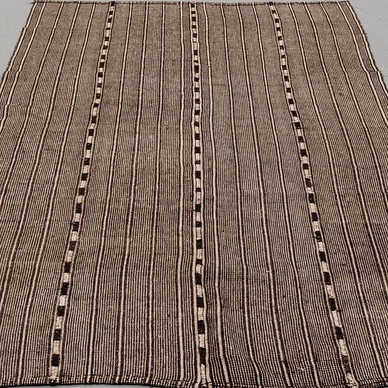 A CARPET, flat weave, around 274 x 150 cm.