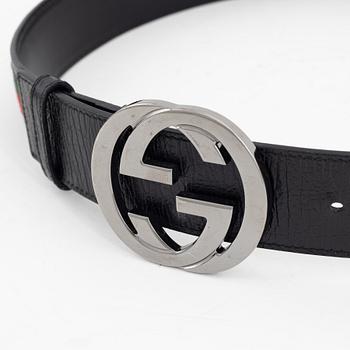 Gucci, a leather and textile belt, size 80.