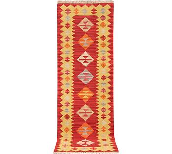 A Kilim runner carpet, c. 197 x 60 cm.