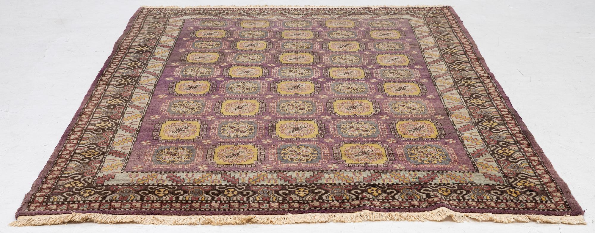 A semi-antique carpet, probably Samarkand, c. 264 x 184 cm.