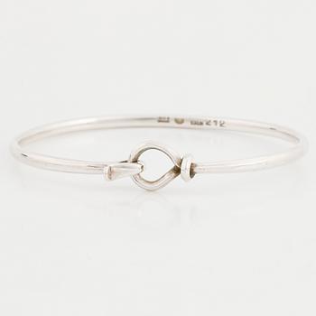 Vivianna Torun Bülow-Hübe, a sterling silver 212 bangle, Georg Jensen, Denmark.