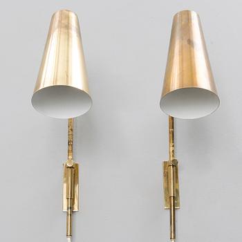 A pair of mid-20th century wall lights for Idman, Finland.