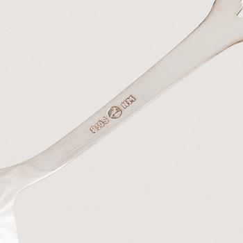 A 37-piece set of dessert cutlery, mostly the same model, with Swedish import marks.