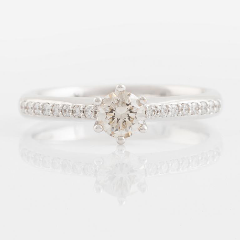 Brilliant cut diamond solitaire ring, with IGI report.
