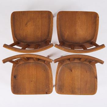 Axel Einar Hjorth, a set of four stained pine "Utö" chairs, Nordiska Kompaniet, Sweden, 1930s.