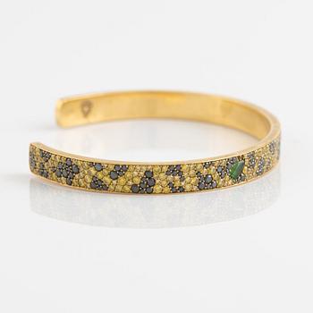 Crow's nest jewels, gold, black and yellow diamond and pear shaped tsavorite bangle.