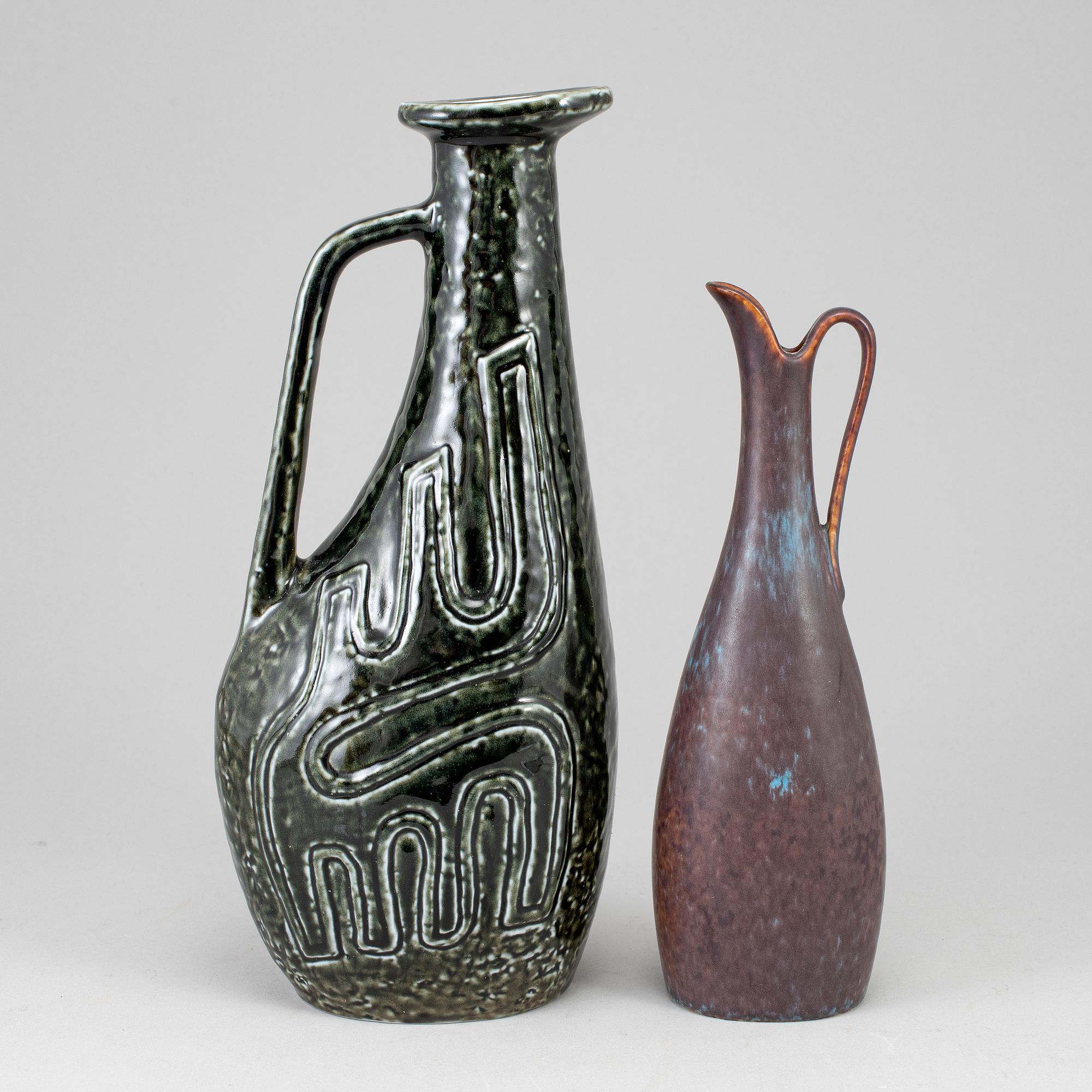 GUNNAR NYLUND, two stoneware jugs, one named "Farina", second half of the 20th century.