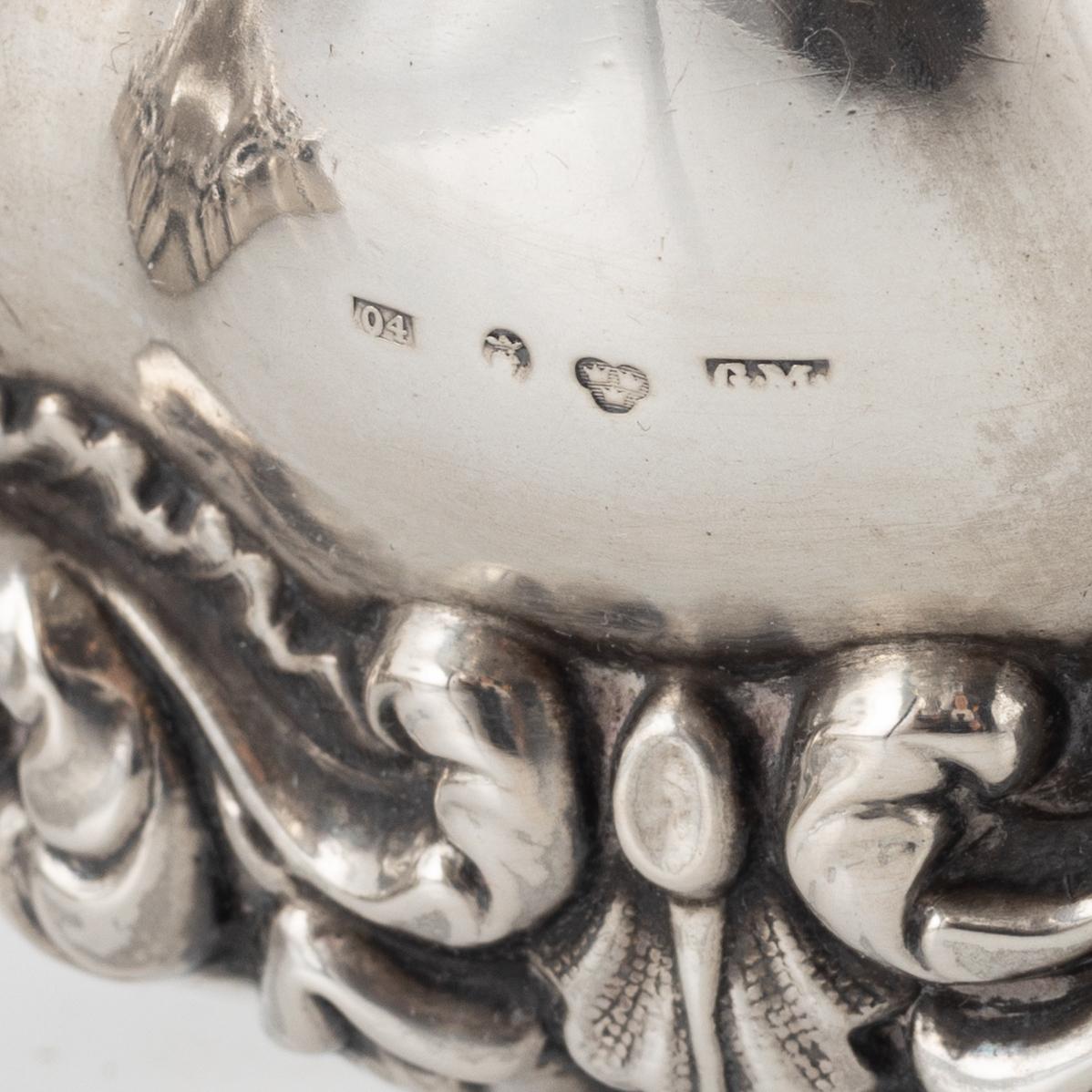 Gustaf Möllenborg, a pair of neo-Rococo silver candlesticks, Stockholm, 1844.