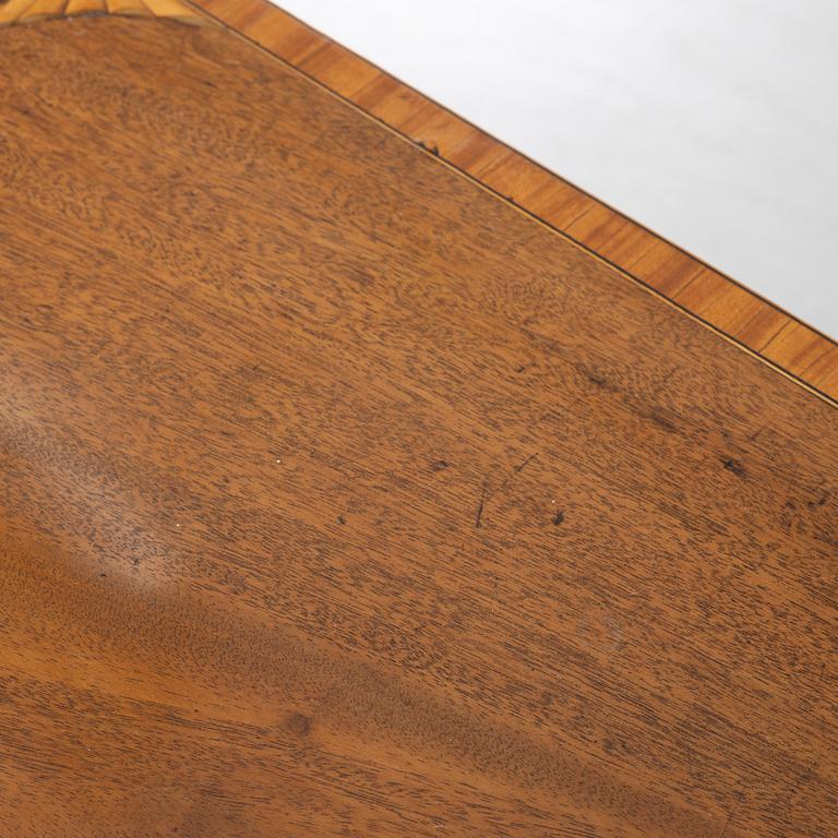 A table, England, circa 1900.