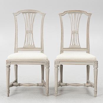 A pair of Gustavian style chairs, early 20th Century.