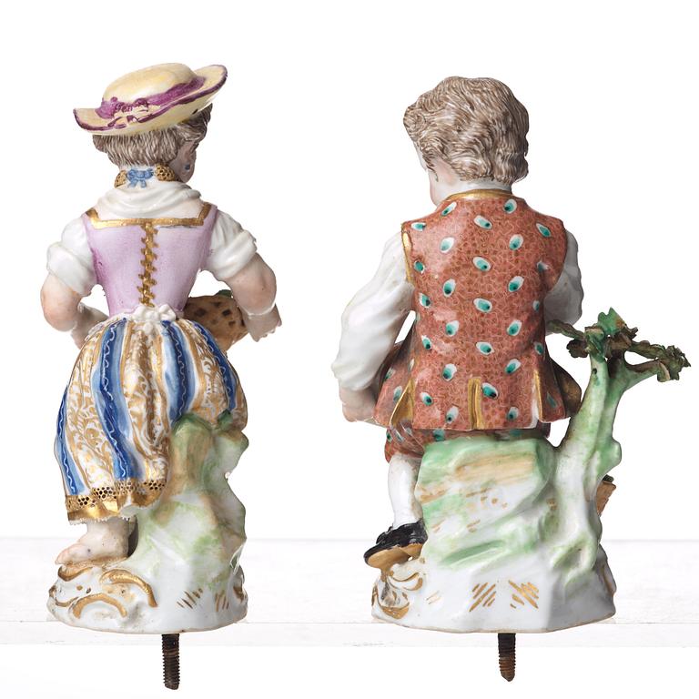 A pair of Meissen Rococo-style three-light candelabra, second half of the 1800's.